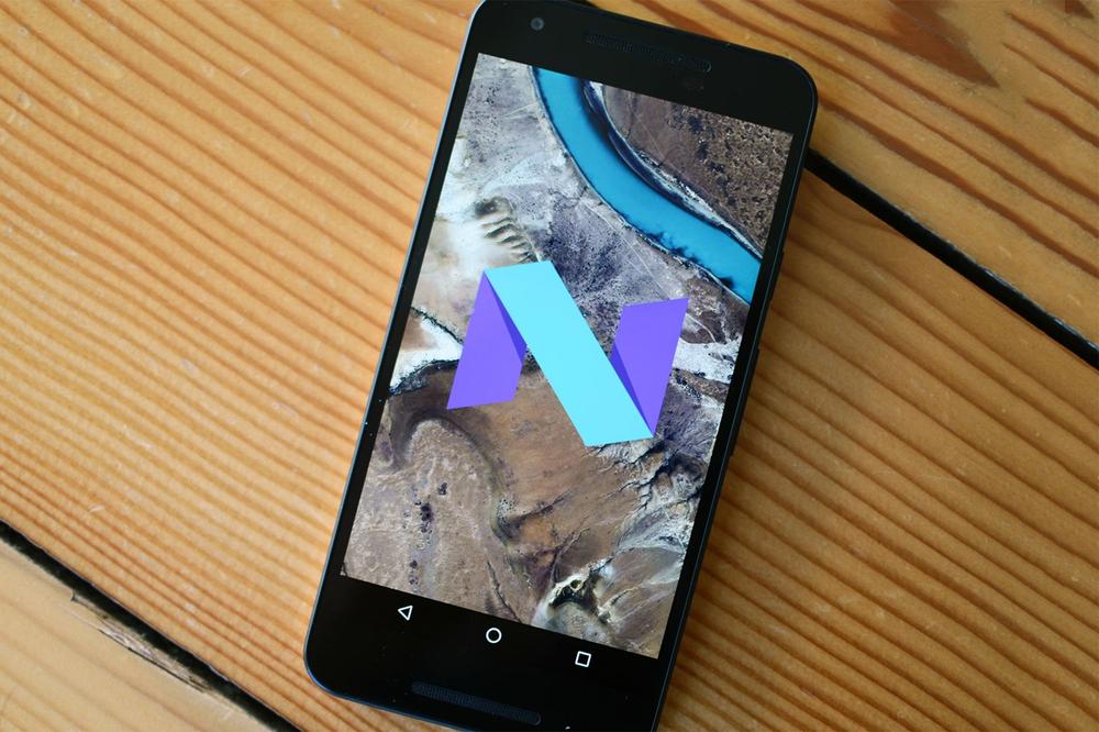 Image of an Android smartphone resting on stained wood planks, showing an \