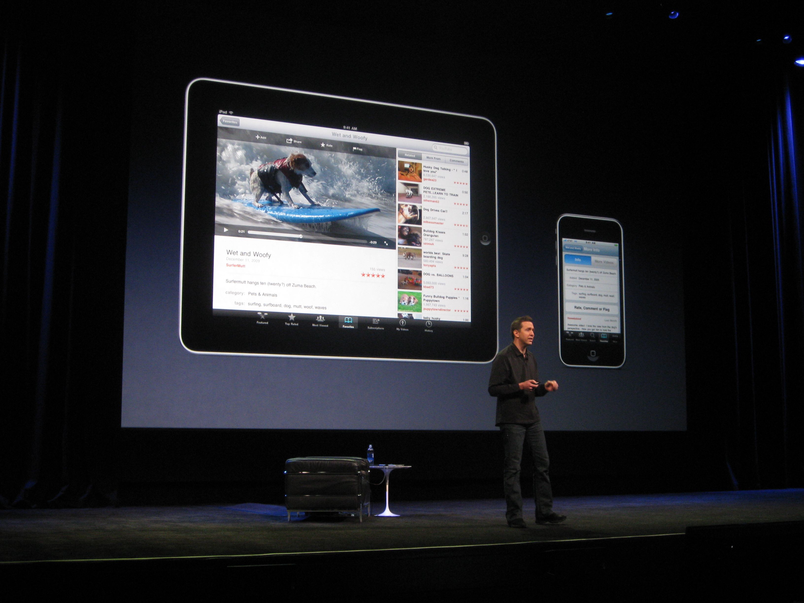 Scott Forstall on stage, making a comparison between iPad and iPhone.